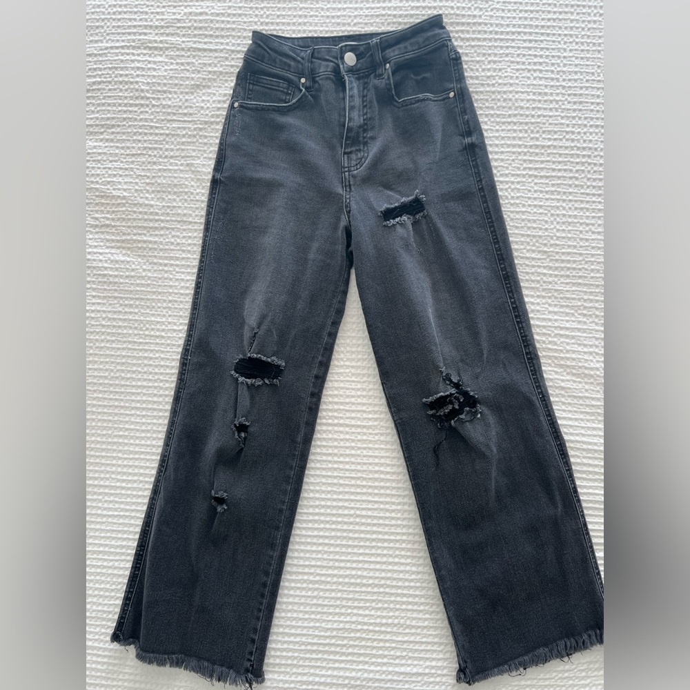 Faded black wide-legged jeans